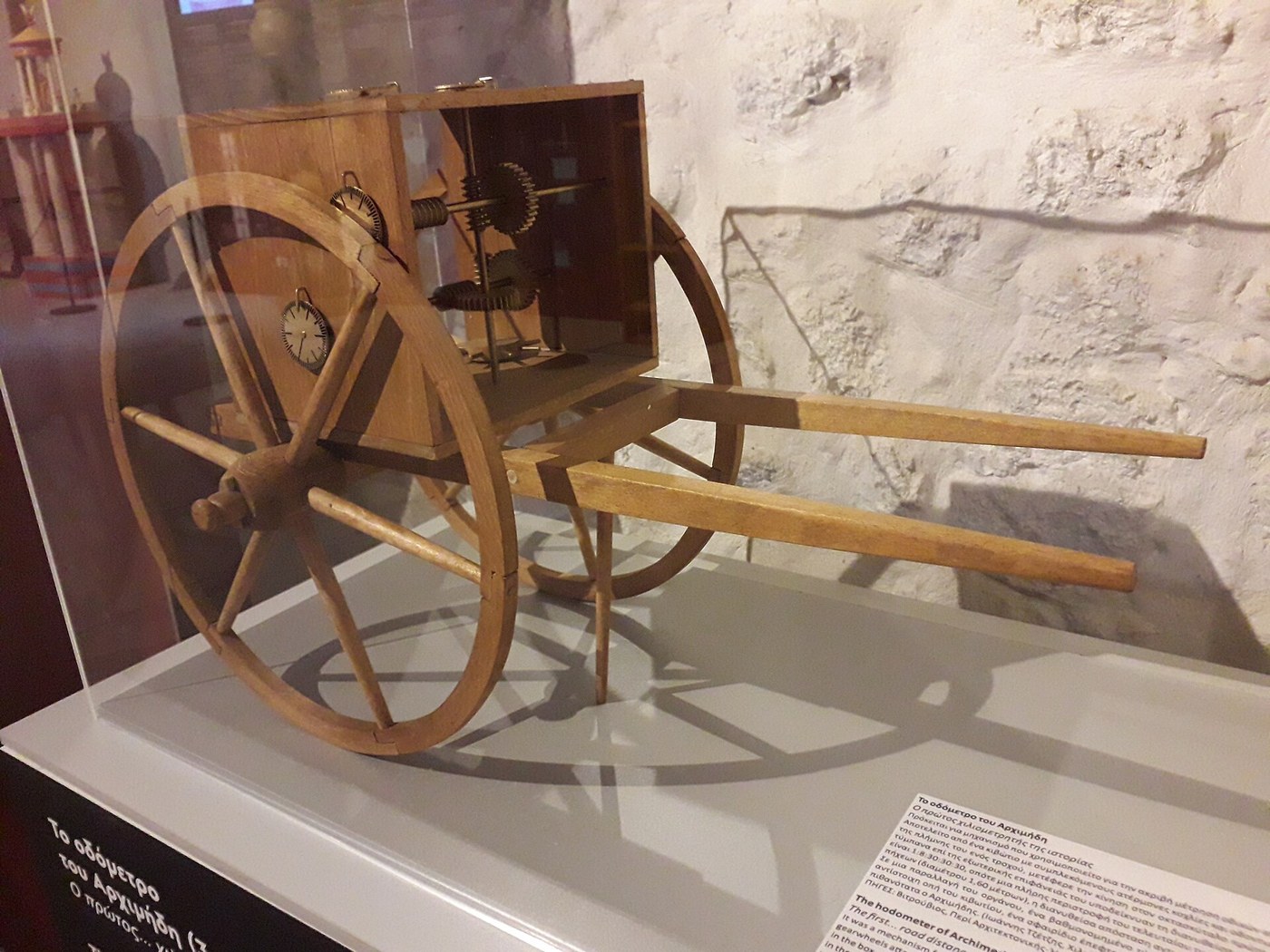 Figure 2 — A working reconstruction of an ancient odometer cart by Kostas Kotsanas, based on the descriptions of Vitruvius (De architectura, Book 10) and Heron of Alexandria (Dioptra 34), displayed by the Mus…