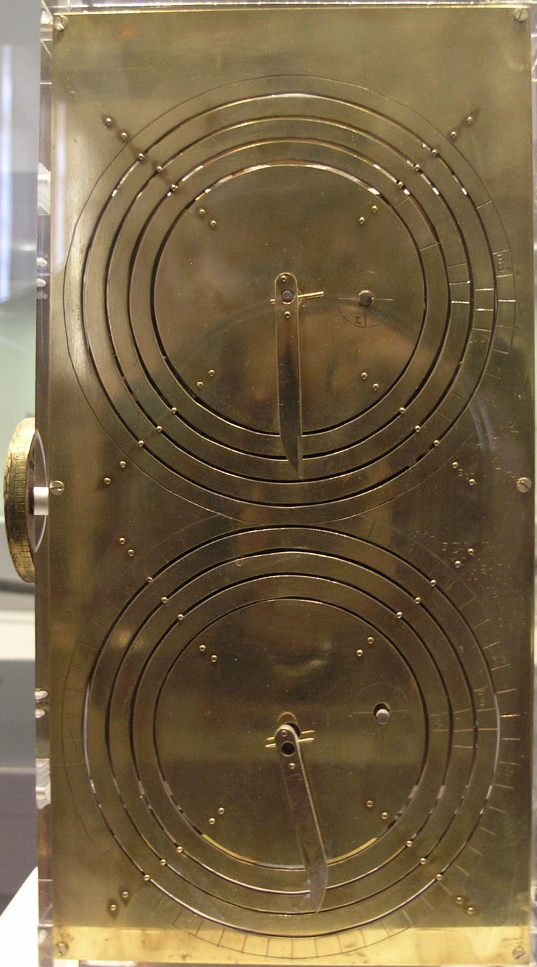 Figure 1 — The replica based on Derek de Solla Price's reconstruction, on display in the National Archaeological Museum, Athens. According to the museum's label it is a box of 33 × 17 × 10 cm holding 32 gears…