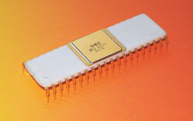 Figure 6 — An early MOS Technology MCS6502 in a white ceramic package. Its date code, 4575, means it was made in the 45th week of 1975, in early November, about seven weeks after the chip was introduced at WE…