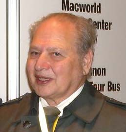 Figure 3 — Ronald Wayne at Macworld in 2009. A draughtsman at Atari, he co-signed the Apple partnership agreement of 1 April 1976, drew the first logo and wrote early documentation, and withdrew on 12 April f…