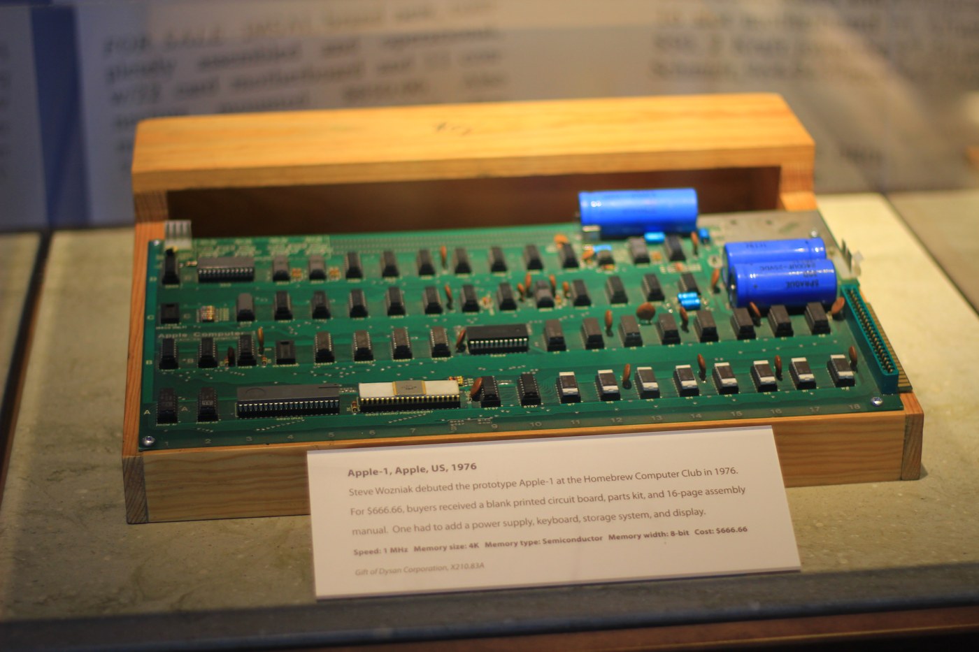 Figure 5 — The Computer History Museum's Apple-1 in its wooden case, in the museum's "Revolution" exhibition, Mountain View, photographed in 2013. The Computer History Museum holds two boards; this one is the…