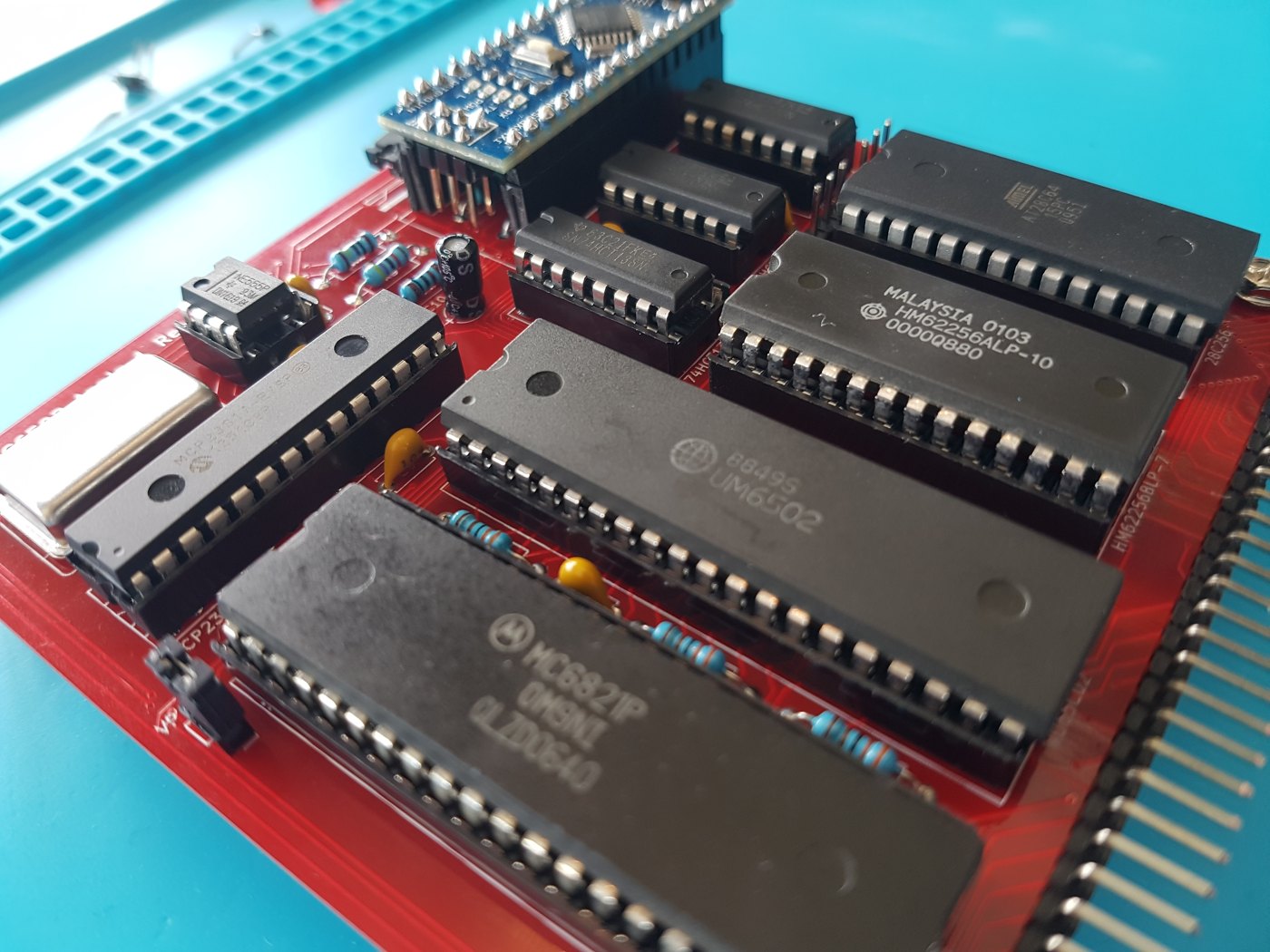 Figure 5 — The RC6502 Apple 1 single-board computer: a 6502 and MC6821 PIA with static RAM and EEPROM, and an Arduino Nano (top left) in place of the video terminal, talking to a PC over USB.