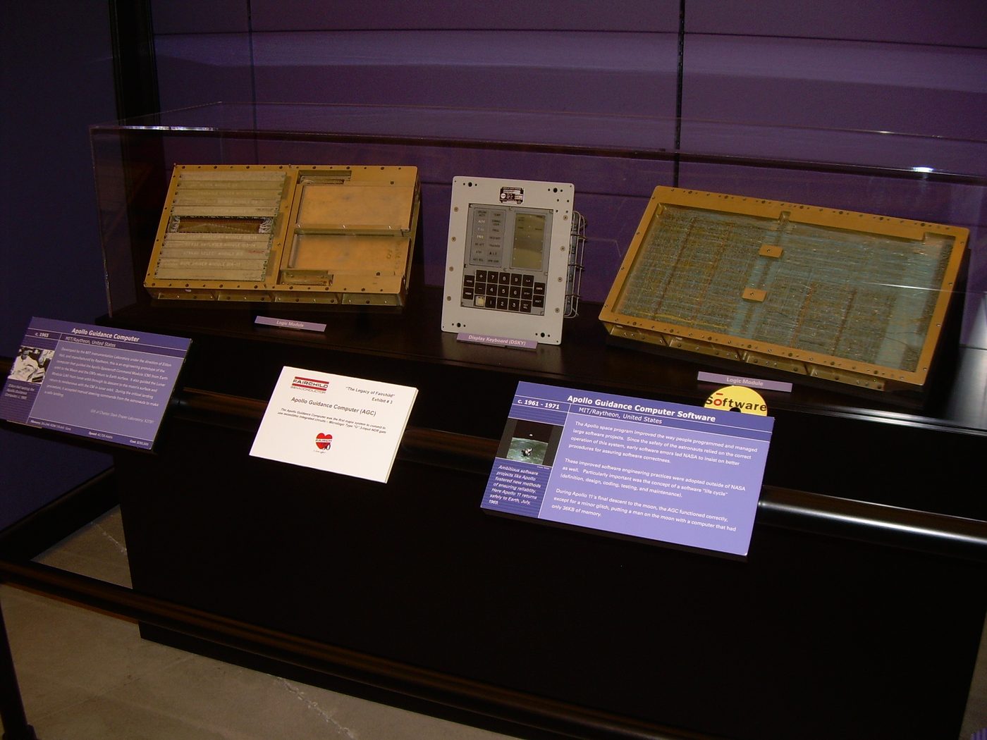 Figure 4 — An Apollo Guidance Computer with its software listings on exhibit at the Computer History Museum, the AGC placed within the wider history of computing. File:Apollo Guidance Computer (c.1…