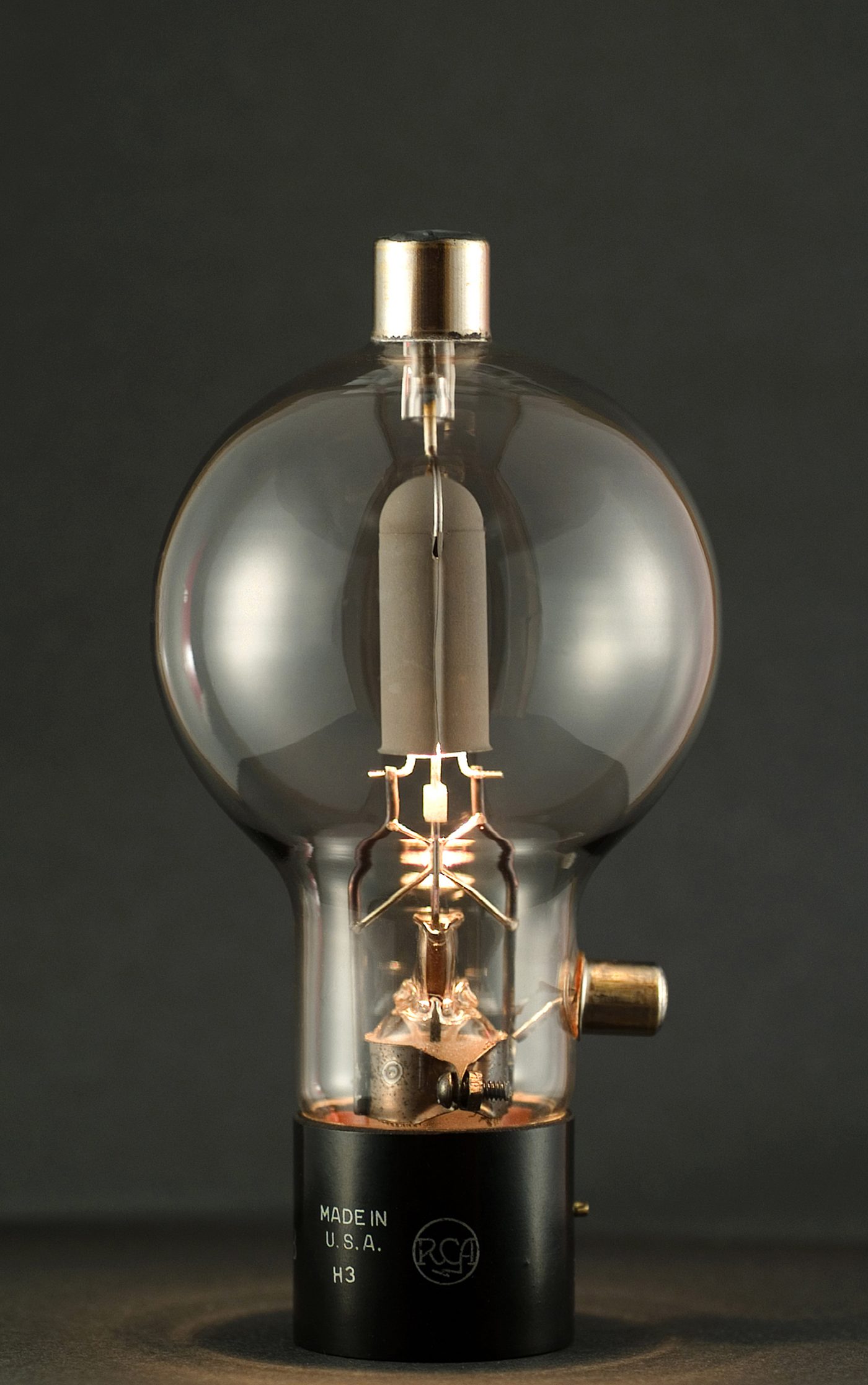 Figure 3 — A power vacuum tube. Colossus computed with roughly 1,500 (Mark 1) to 2,400 (Mark 2) such thermionic valves, switching at electronic speed. Photo: File:RCA '808' Power Vacuum Tube.jpg by…