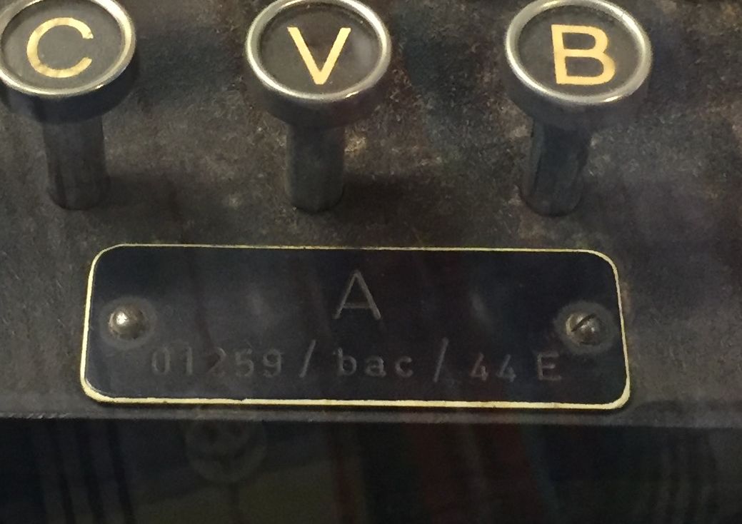 Figure 5 — Close-up of an Enigma keyboard. With no printer, the operator pressed a key and a corresponding lamp lit; a second operator read off the cipher letters. File:Enigma keyboard at MITflea e…