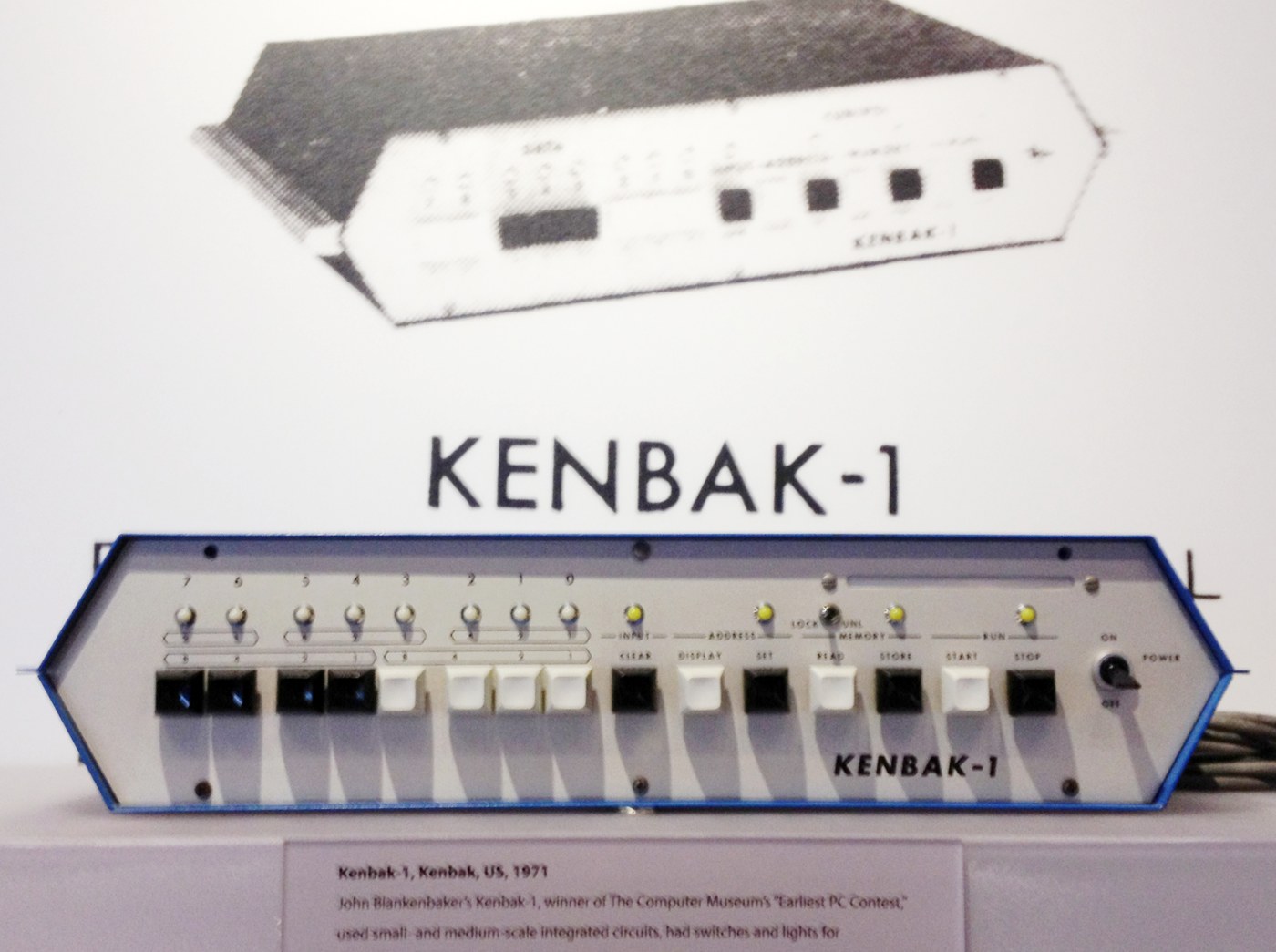 Figure 2 — Serial 216 in the Computer History Museum's permanent exhibition in Mountain View, California, below an enlargement of the 1971 advertising photograph. The label calls it the "winner of The Compute…