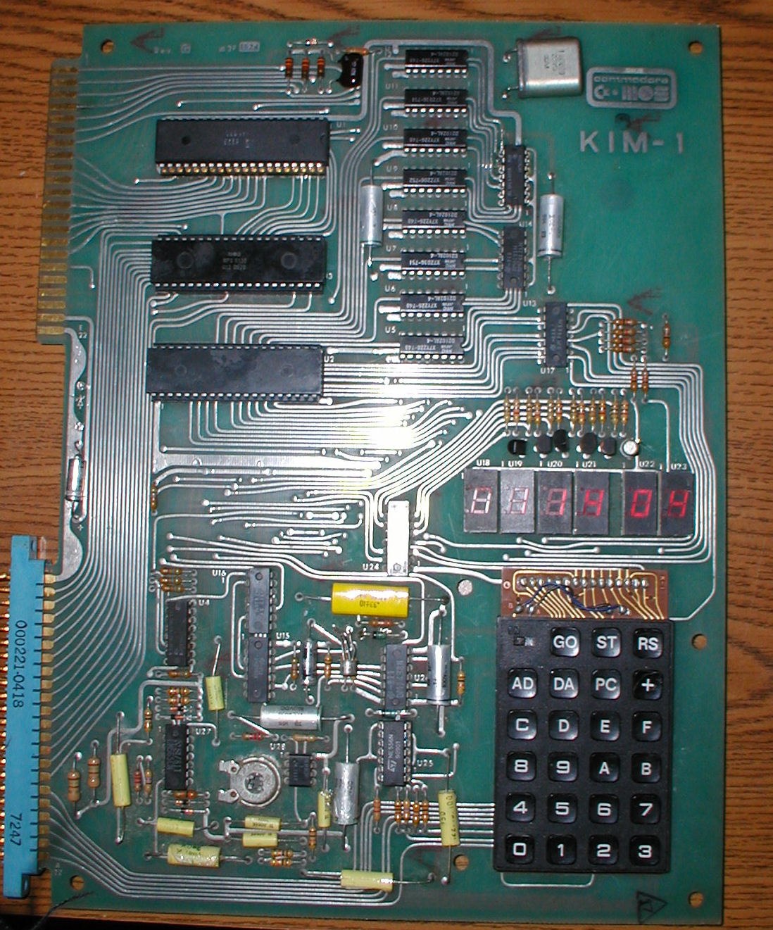 Figure 1 — A Commodore-built KIM-1 (revision G) running, its six digits lit above the keypad. Every program in this volume uses those six digits and that keypad as its only output and input, as most KIM-1 pro…