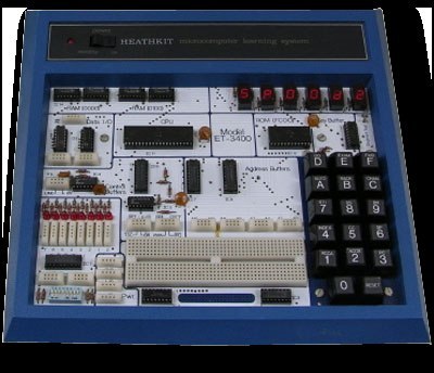 Figure 5 — The Heathkit ET-3400 microprocessor trainer (1977): a Motorola 6800 with a hex keypad, six seven-segment digits and a breadboard. Like the KIM-1, it was programmed in machine code from its keypad; …