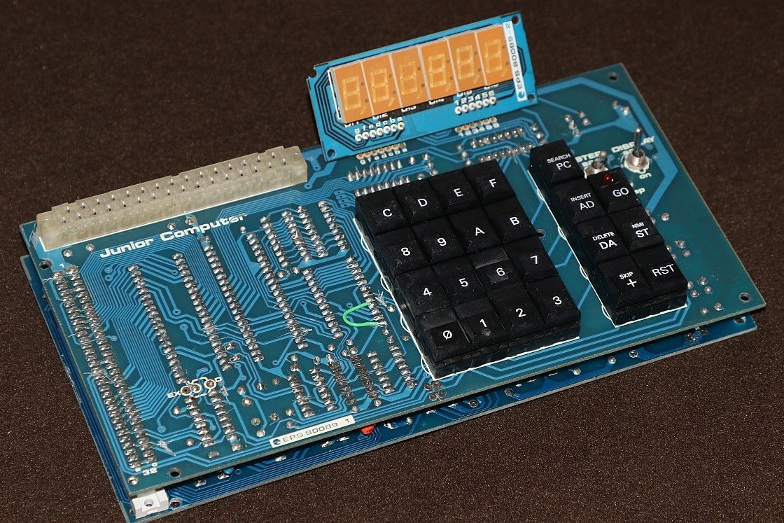 Figure 6 — Elektor's Junior Computer (1980): the KIM-1's keypad-and-six-digit design rebuilt by a magazine for its readers, with a stock 6532 RIOT and an EPROM monitor instead of MOS's custom 6530s.