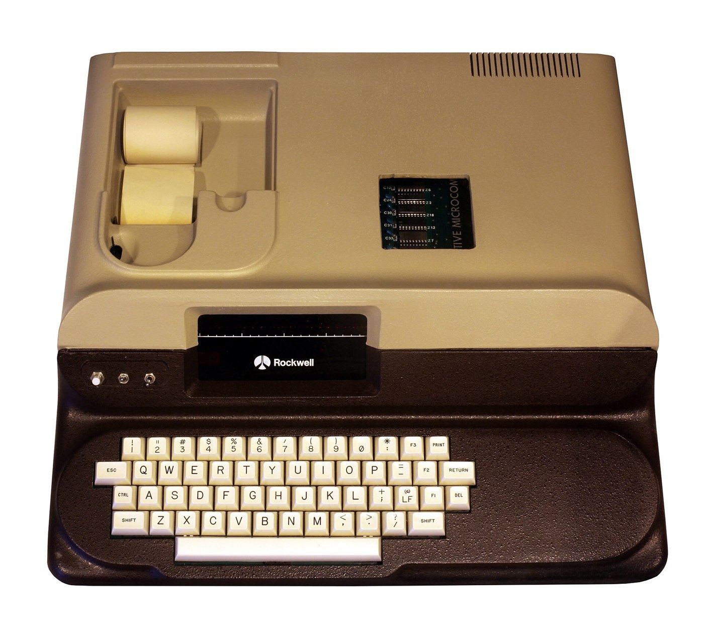 Figure 4 — The Rockwell AIM-65 (1978) in its case: a full keyboard, a 20-character display and a thermal printer for paper tape listings. Rockwell built it after Commodore declined to license a KIM-1 clone.