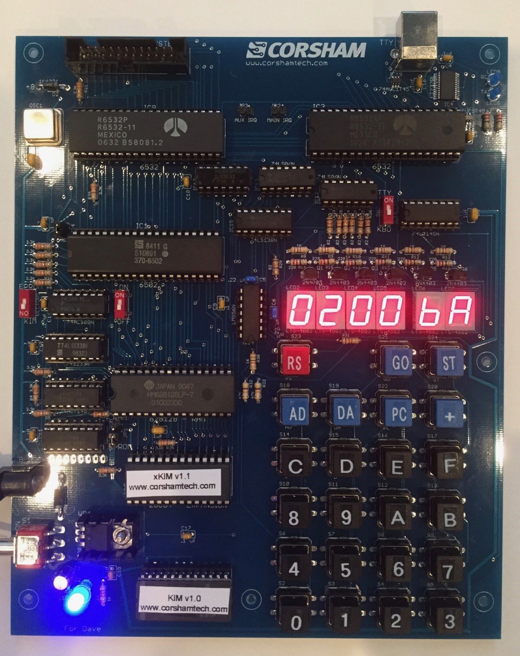 Figure 4 — The Corsham Technologies KIM Clone, revision 1B (2017), running with "0200 6A" on its display. Bob Applegate's design used two Rockwell 6532s, more RAM, a USB connection for the teleprinter and a m…