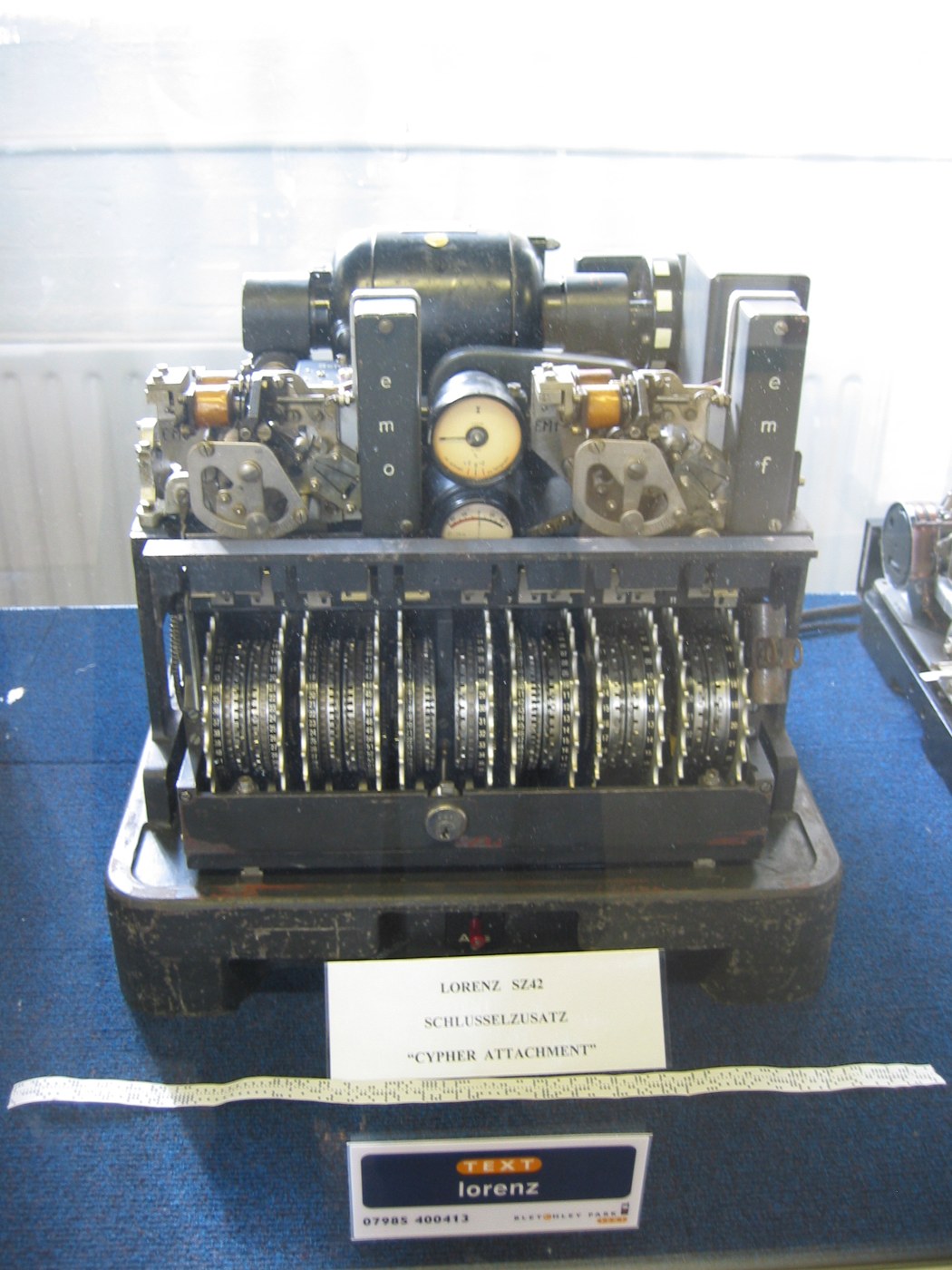 Figure 1 — A Lorenz SZ42 on display at Bletchley Park, photographed in 2005. The twelve pinwheels sit in a row across the front of the machine; the attachment was wired between a teleprinter and the radio lin…