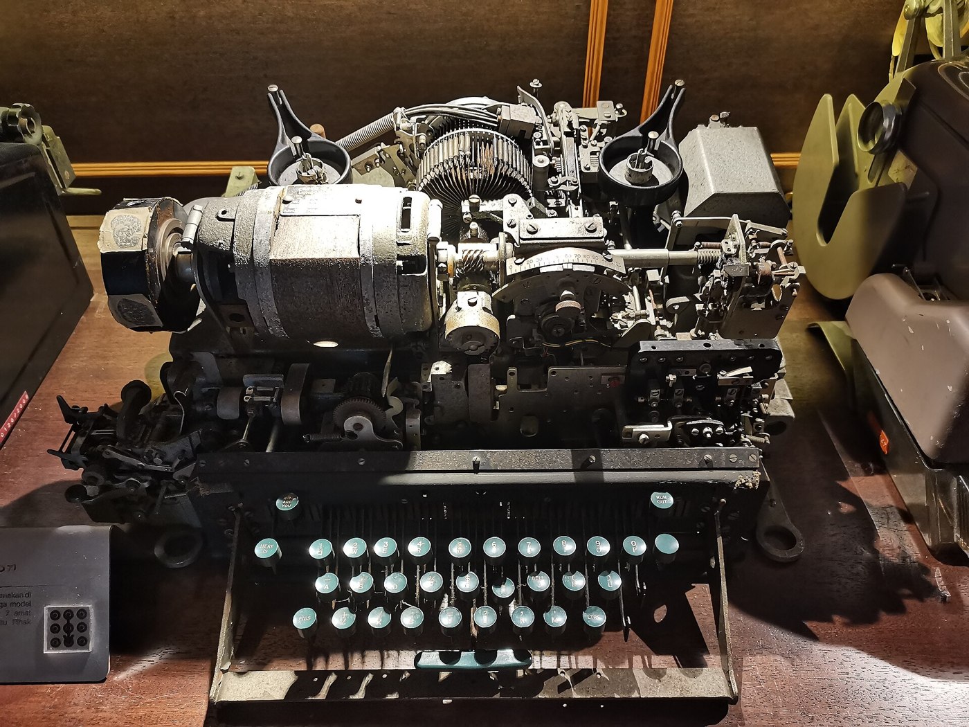 Figure 1 — A Creed 7 teleprinter, the standard British five-unit start-stop machine of the Tunny years and the kind of instrument the replica's loop interface is designed to drive. Like the German machines on…