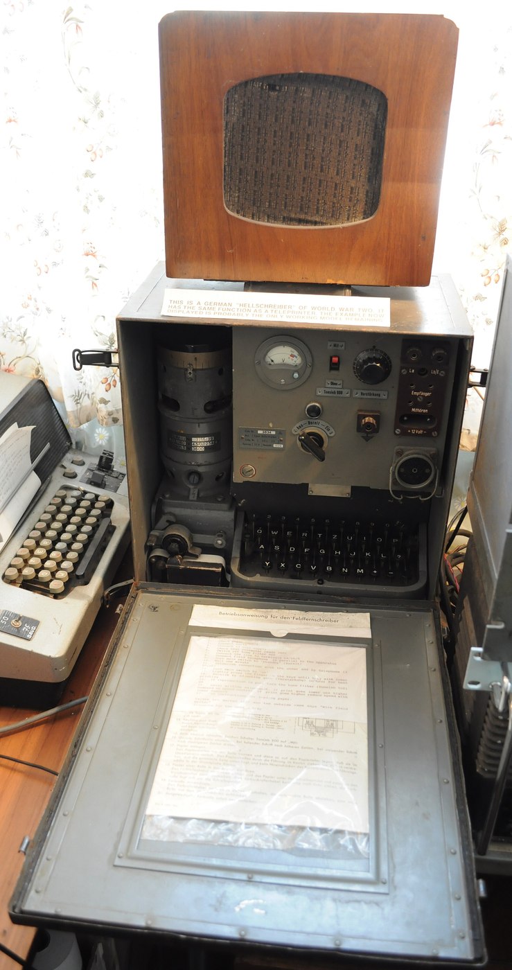 Figure 3 — A German Hellschreiber in the Bletchley Park museum. The machine printed each received character as a small scanned image on paper strip, so that an operator could read it by eye even through inter…