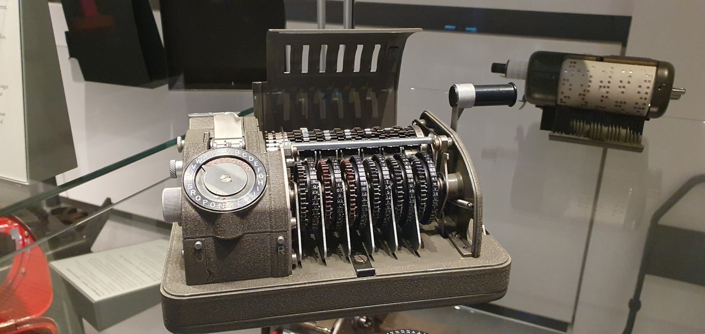 Figure 3 — A CX-52 with its cover raised, in the Deutsches Museum, Munich. The stack of pinwheels — larger and more numerous in their choice of sizes than the M-209's — sits in front of the lug drum; the prin…