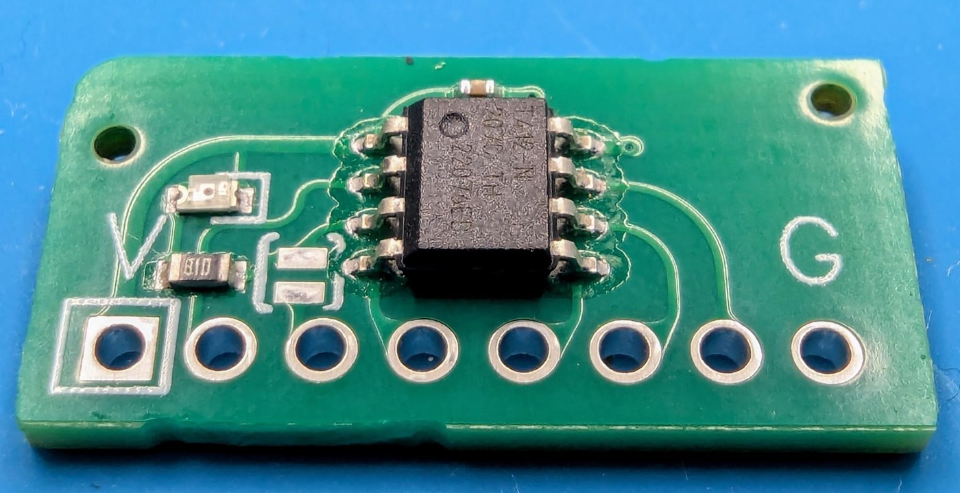 Figure 8 — An assembled card as it arrives from the board house, before the header is fitted. Only the header is hand-soldered; the SMD parts are placed by the assembler.