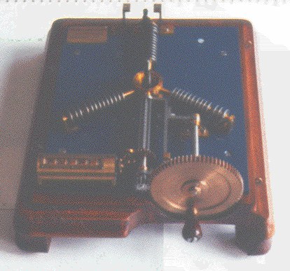 Figure 6 — The base of the Carissan machine with its congruence rings removed, showing the drive train and the six-figure counter. The precision instrument was made by Chateau Frères of Paris.