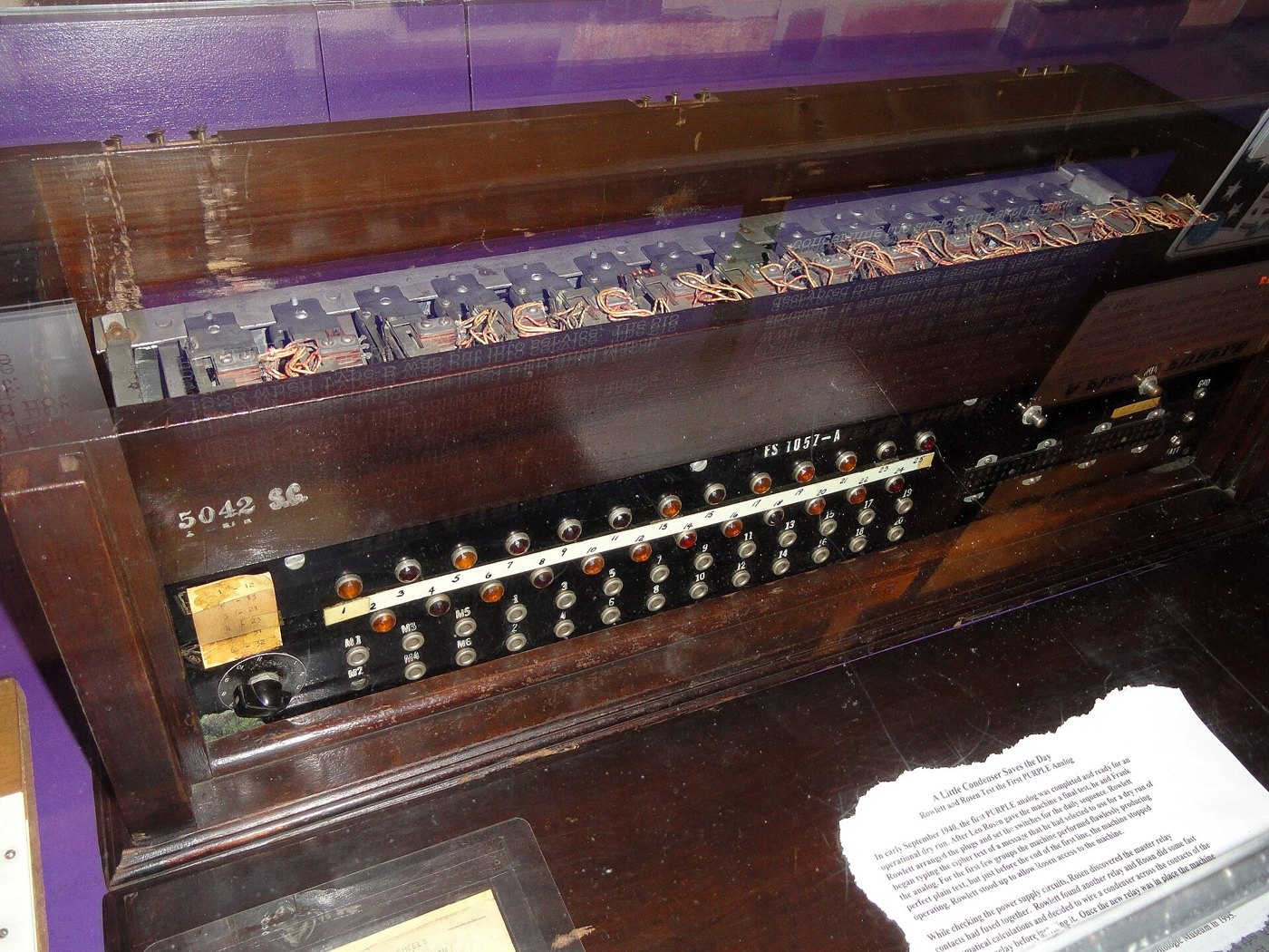 Figure 4 — "PURPLE Analog No. 1" at the National Cryptologic Museum: the SIS-built machine, with its plugboard across the front and banks of telephone stepping switches inside the wooden case. Its makers had …