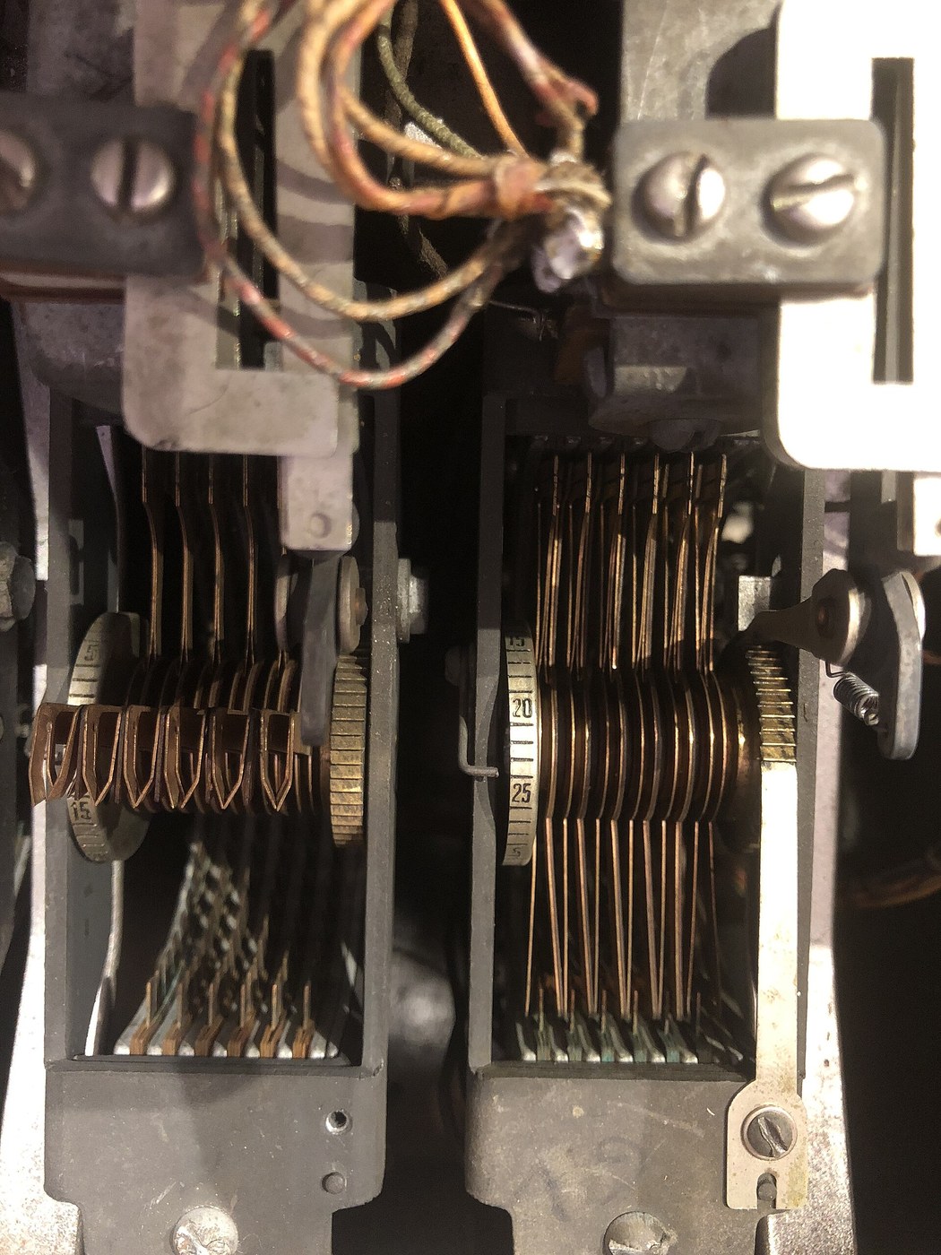 Figure 1 — Inside PURPLE Analog No. 1 at the National Cryptologic Museum: six-level stepping switches with the strapping soldered to their bank terminals. Every contact on every cipher level carries a wire to…