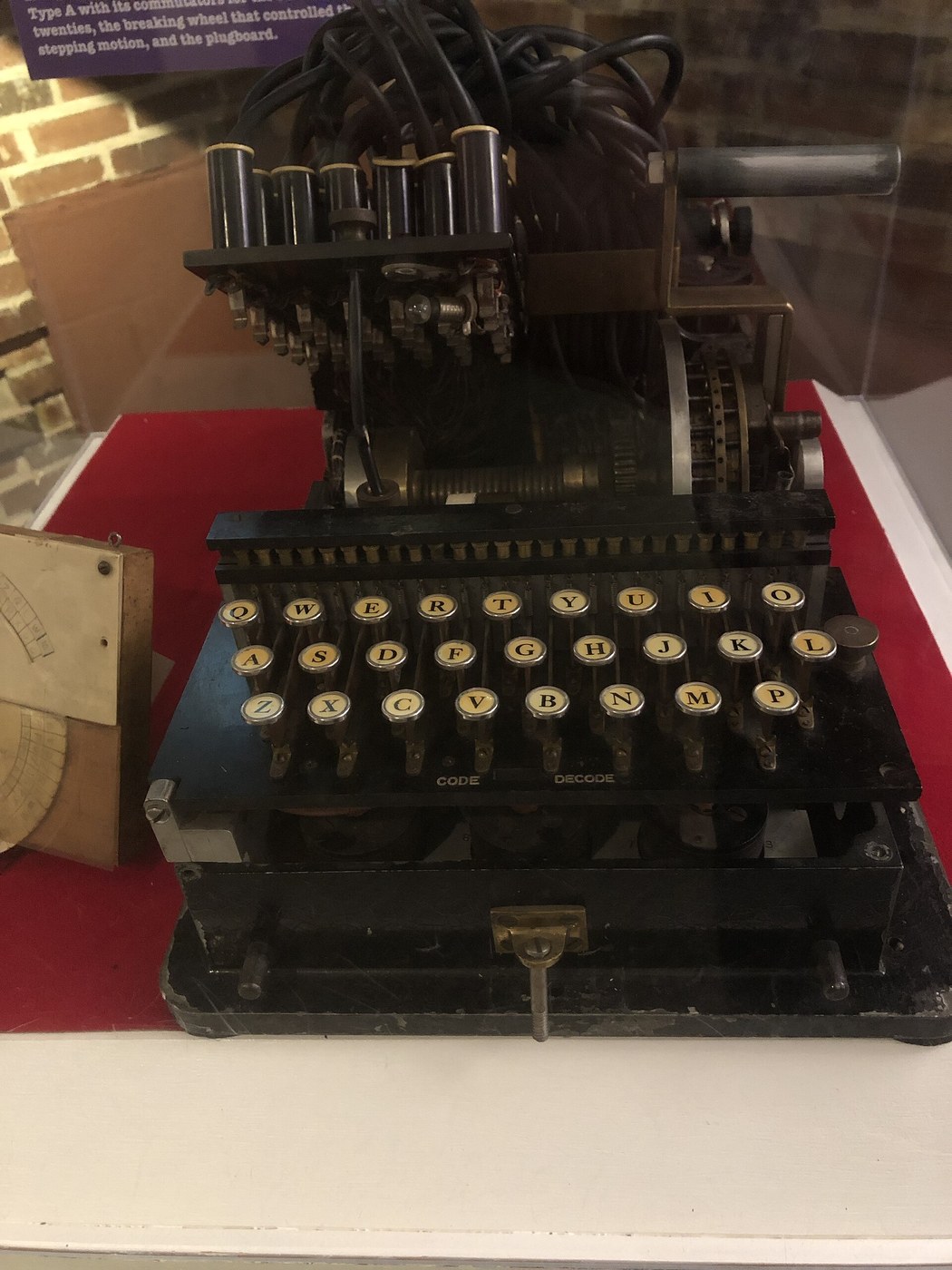 Figure 7 — A US-built mechanical analog of RED at the National Cryptologic Museum: a typewriter-style keyboard in front, with the alphabet wheels and stepping gear above it.